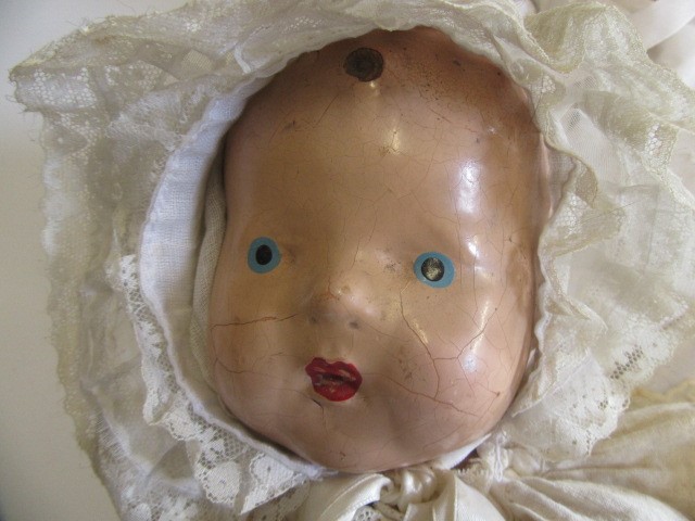 Seven celluloid and composition head dolls including Pedigree Image