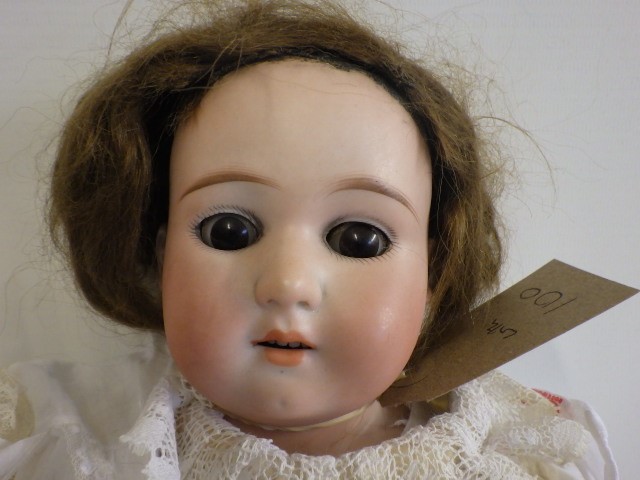 An Armand Marseille "Floradora" Bisque shoulder head doll Image