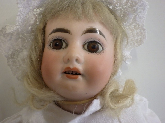 An Armand Marseille bisque socket head doll Image