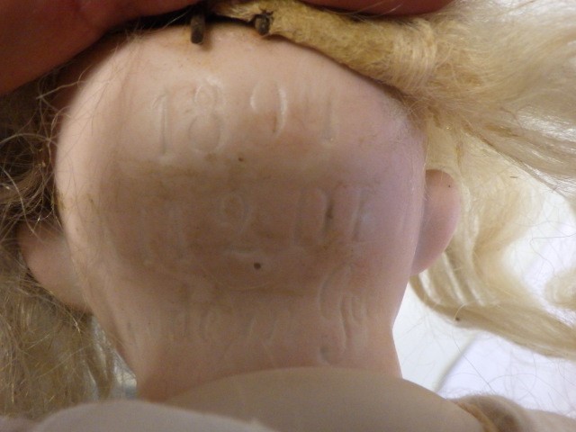 An Armand Marseille bisque socket head doll Image