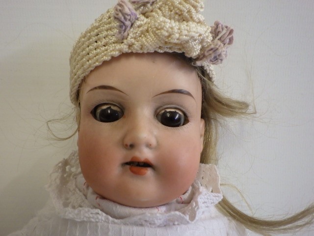 An Armand Marseille bisque shoulder head doll Image