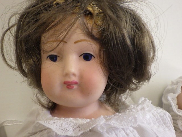 Four bisque head dolls comprising two Armand Marseille baby dolls with sleeping eyes Image
