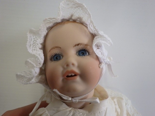 Four bisque head dolls comprising two Armand Marseille baby dolls with sleeping eyes Image