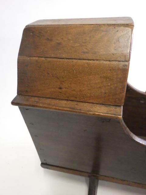 A Victorian mahogany doll's crib Image