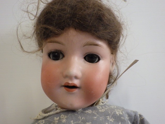 An Armand Marseille bisque socket head doll Image