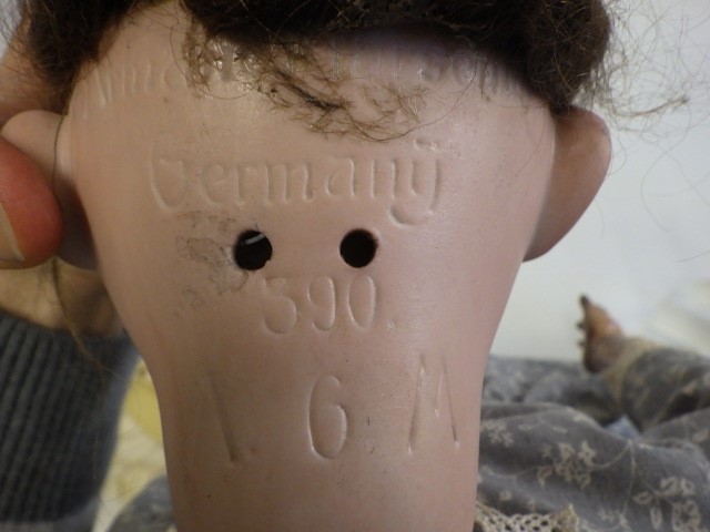 An Armand Marseille bisque socket head doll Image