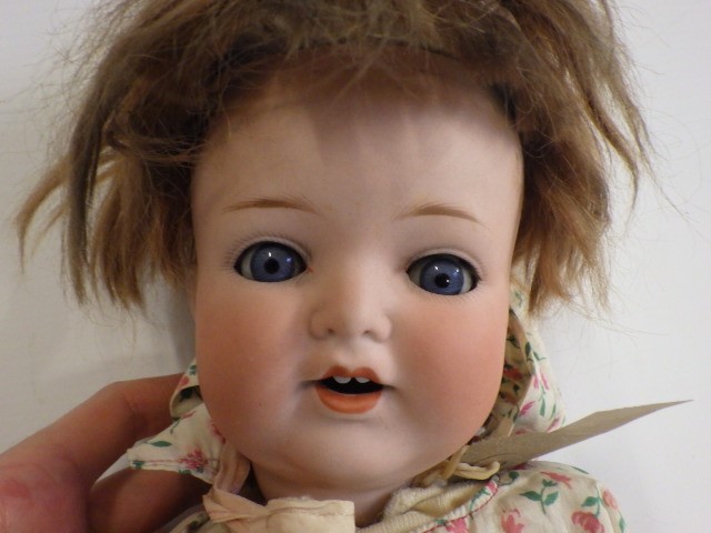 An Armand Marseille Koppelsdorf bisque socket head doll Image