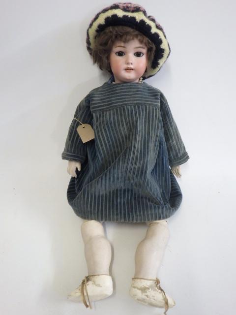 A Simon & Halbig bisque socket head doll Image