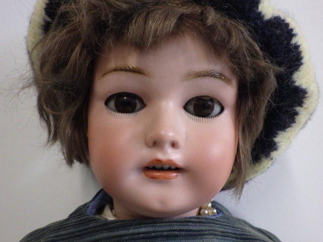 A Simon & Halbig bisque socket head doll Image