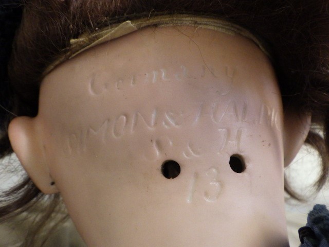 A Simon & Halbig bisque socket head doll Image