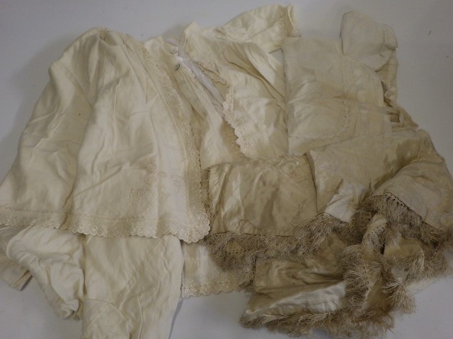A large quantity of doll's clothing and accessories including antique pieces Image