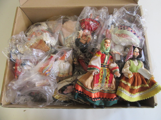 A collection of approximately thirty eight miniature world dolls Image