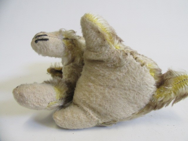 A pre-war squeeze box musical dog Image