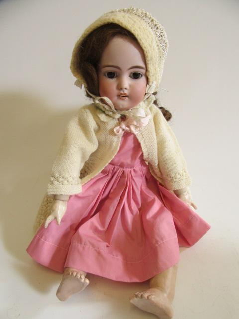 A Simon & Halbig bisque socket head doll Image