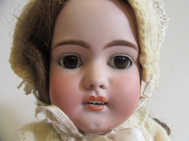 A Simon & Halbig bisque socket head doll Image