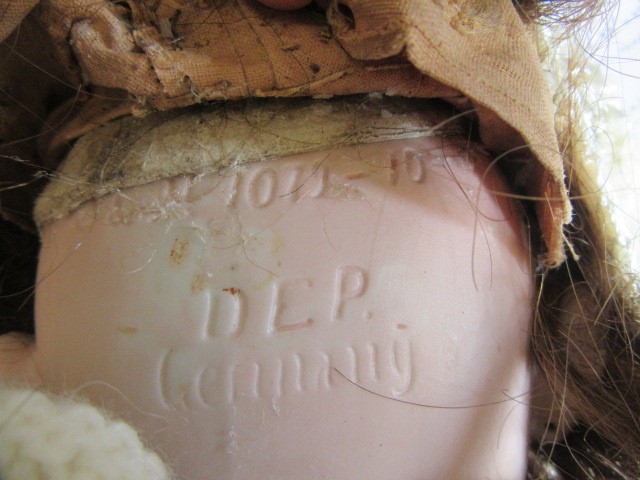 A Simon & Halbig bisque socket head doll Image