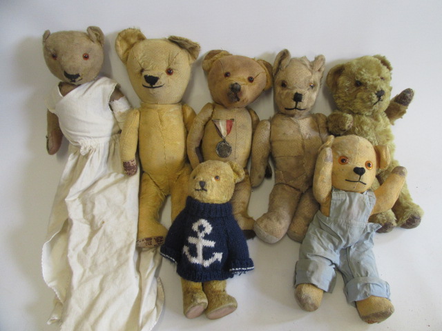 A collection of seven vintage teddy bears Image