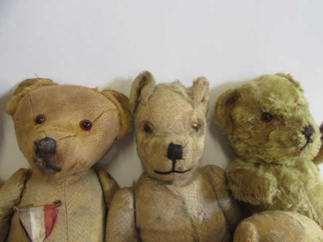 A collection of seven vintage teddy bears Image