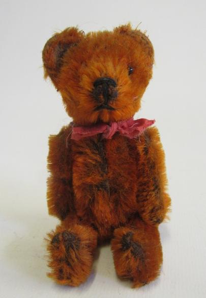 A rare pre-war dark orange Schuco teddy Image