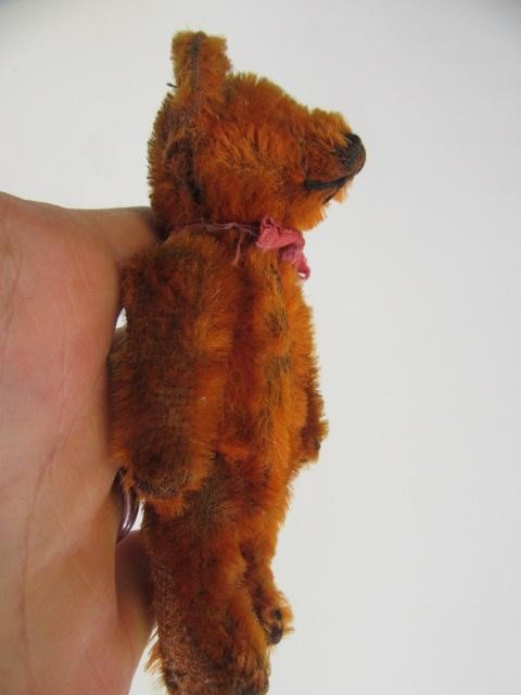 A rare pre-war dark orange Schuco teddy Image