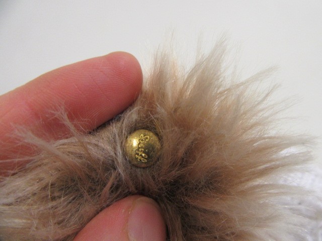 A Steiff grey long haired bear Image