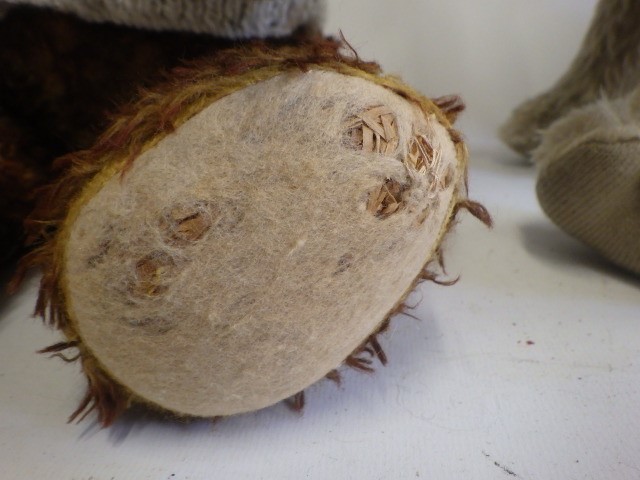 Four stuffed animals comprising a large camel Image