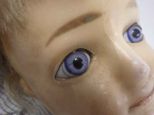 A wax shoulder head doll Image