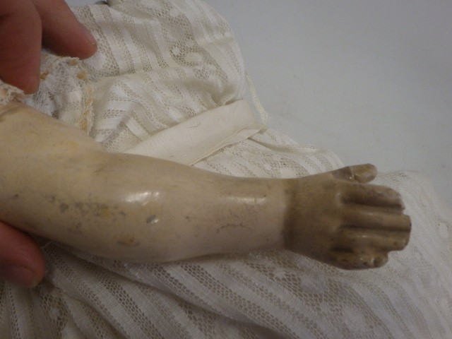 A wax shoulder head doll Image