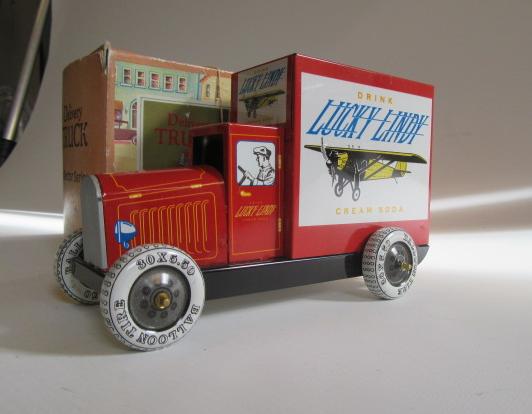 A modern issue tinplate truck Lucky Lindy Image