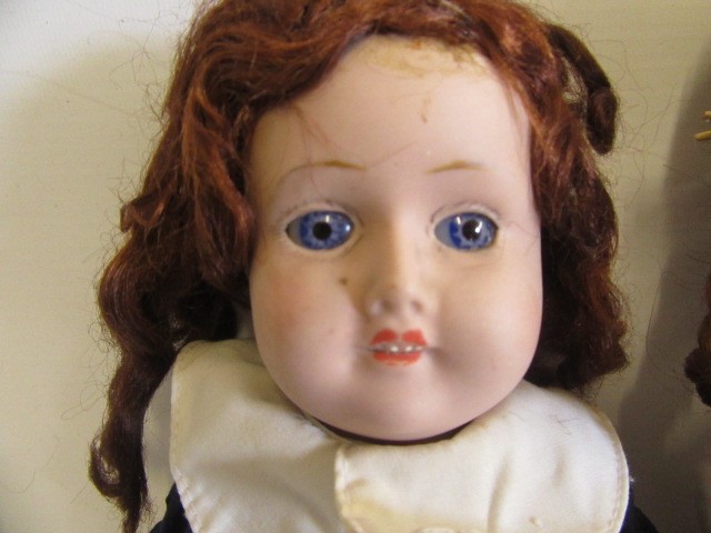A bisque shoulder head doll Image
