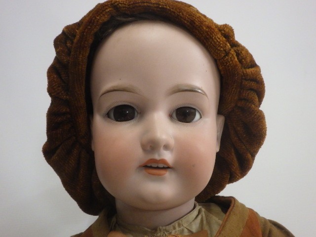 A large Armand Marseille bisque socket head doll Image