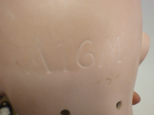 A large Armand Marseille bisque socket head doll Image