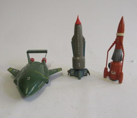 Three plastic Thunderbird toys comprising T.B.1 Image