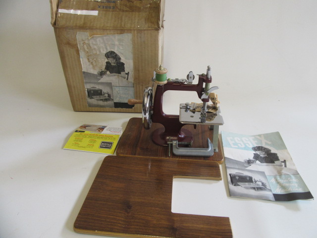 Essex miniature sewing machine finished in maroon with extension sewing table Image