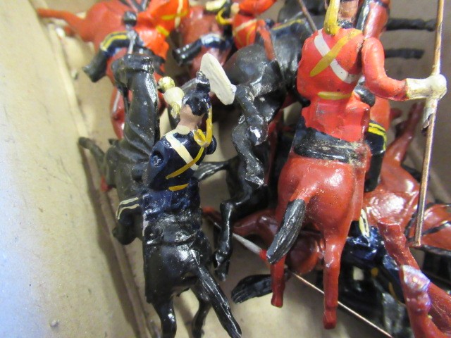 Solid cast Lancers on horseback Image
