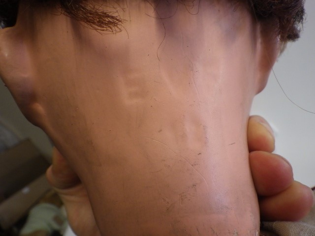 A composition socket head doll Image