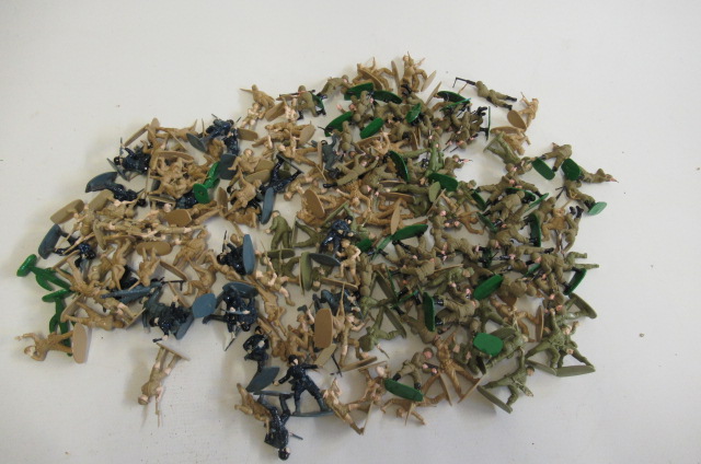 A large quantity of scale plastic soldiers by Airfix and others Image