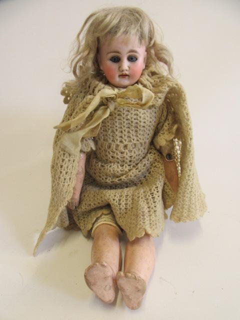 A German bisque shoulder head doll Image