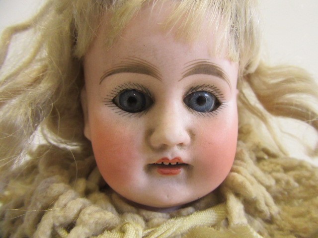 A German bisque shoulder head doll Image