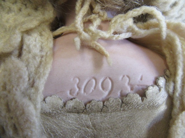 A German bisque shoulder head doll Image