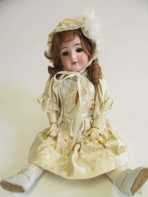 A Schoenau & Hoffmeister bisque socket head doll Image