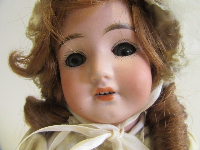 A Schoenau & Hoffmeister bisque socket head doll Image