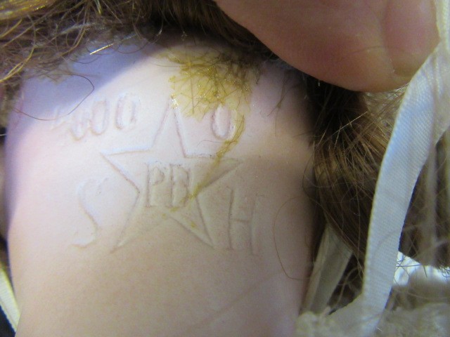 A Schoenau & Hoffmeister bisque socket head doll Image