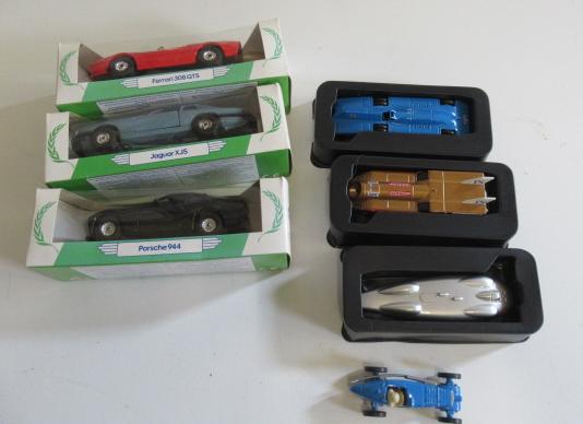 Seven sports and race cars by Corgi and Lledo including Blue Bird and Jaguar Image