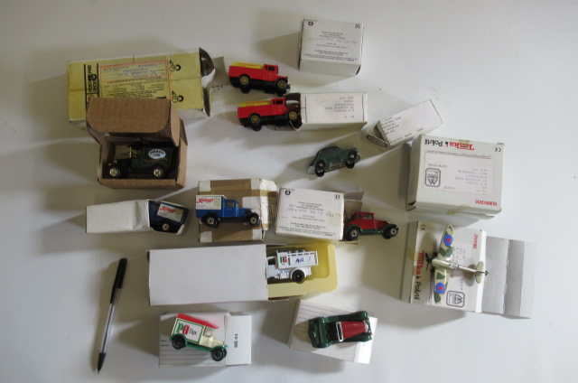 Thirteen Lledo and Matchbox vehicles including vintage cars and vans and three model spitfires Image