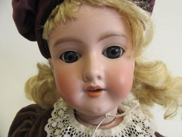 An Armand Marseille bisque socket head doll Image