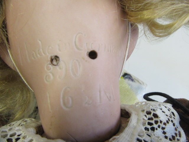 An Armand Marseille bisque socket head doll Image