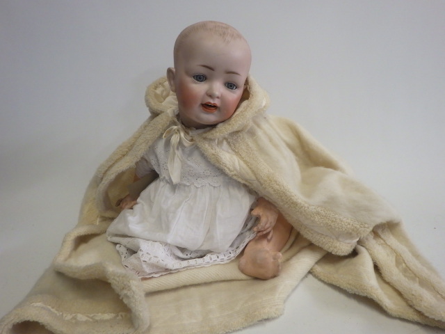A bisque socket head character baby doll Image