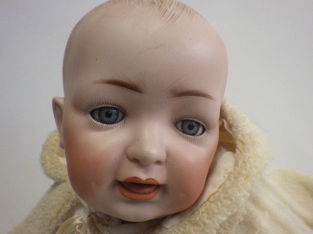 A bisque socket head character baby doll Image