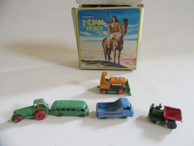 Five playworn Matchbox vehicles and a tin mechanical Indian on horse (Est. plus 21% premium inc. Image
